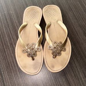 Diane Von Furstenberg gold with little gems flip flops size 9